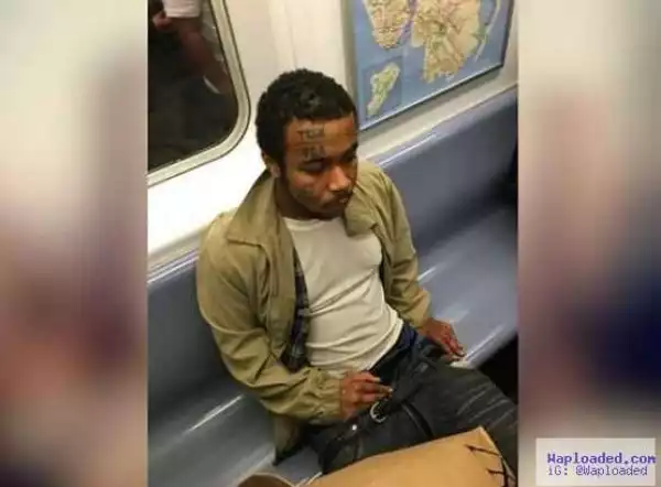 Man caught masturbating on a train while staring at a woman (photo)